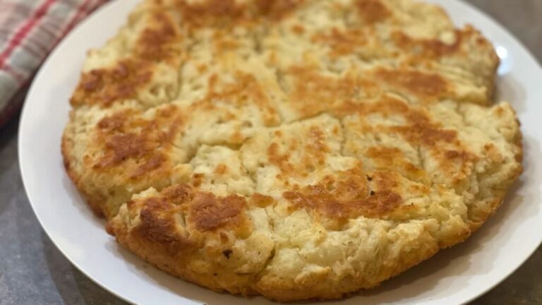 fresh baked skillet bread dumped out of a plate